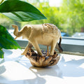 Hand-Carved Parasite Wood Walking Elephant Sculpture – product view