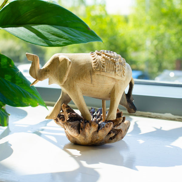 Hand-Carved Parasite Wood Walking Elephant Sculpture – product view