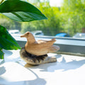 Hand-Carved Parasite Wood Resting Duck Sculpture – product view