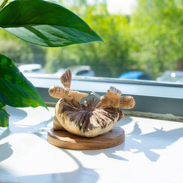 Hand-Carved Parasite Wood Beehive and Bees Sculpture – product view