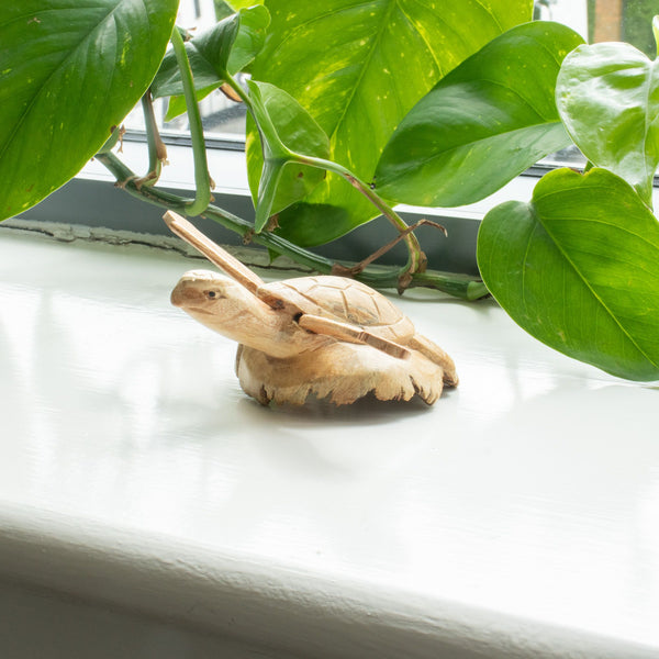 Hand-Carved Parasite Wood Sea Turtle Sculpture – product view